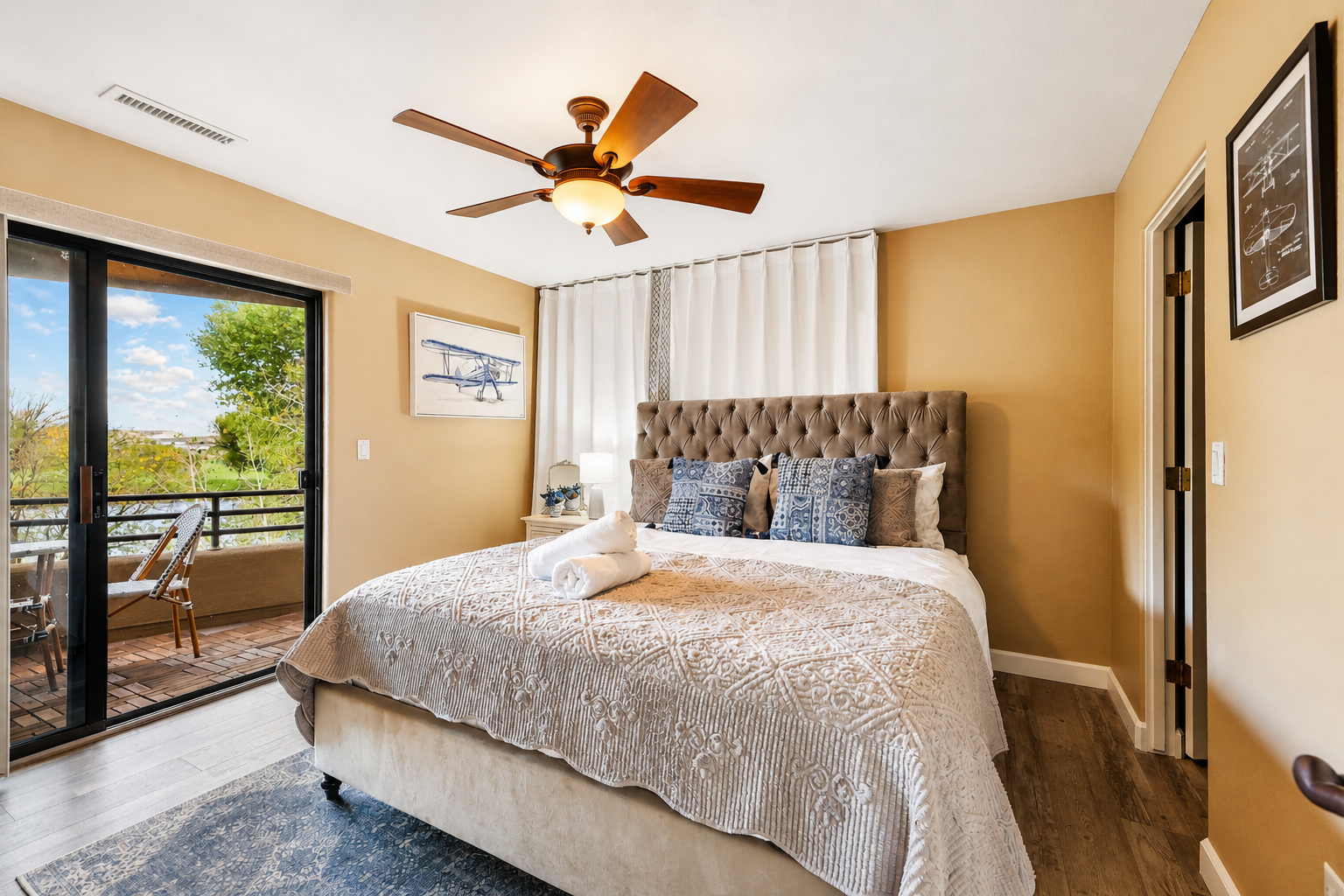 Waterfront Clubhouse at Antelope Hills second-floor king bedroom with golf course view