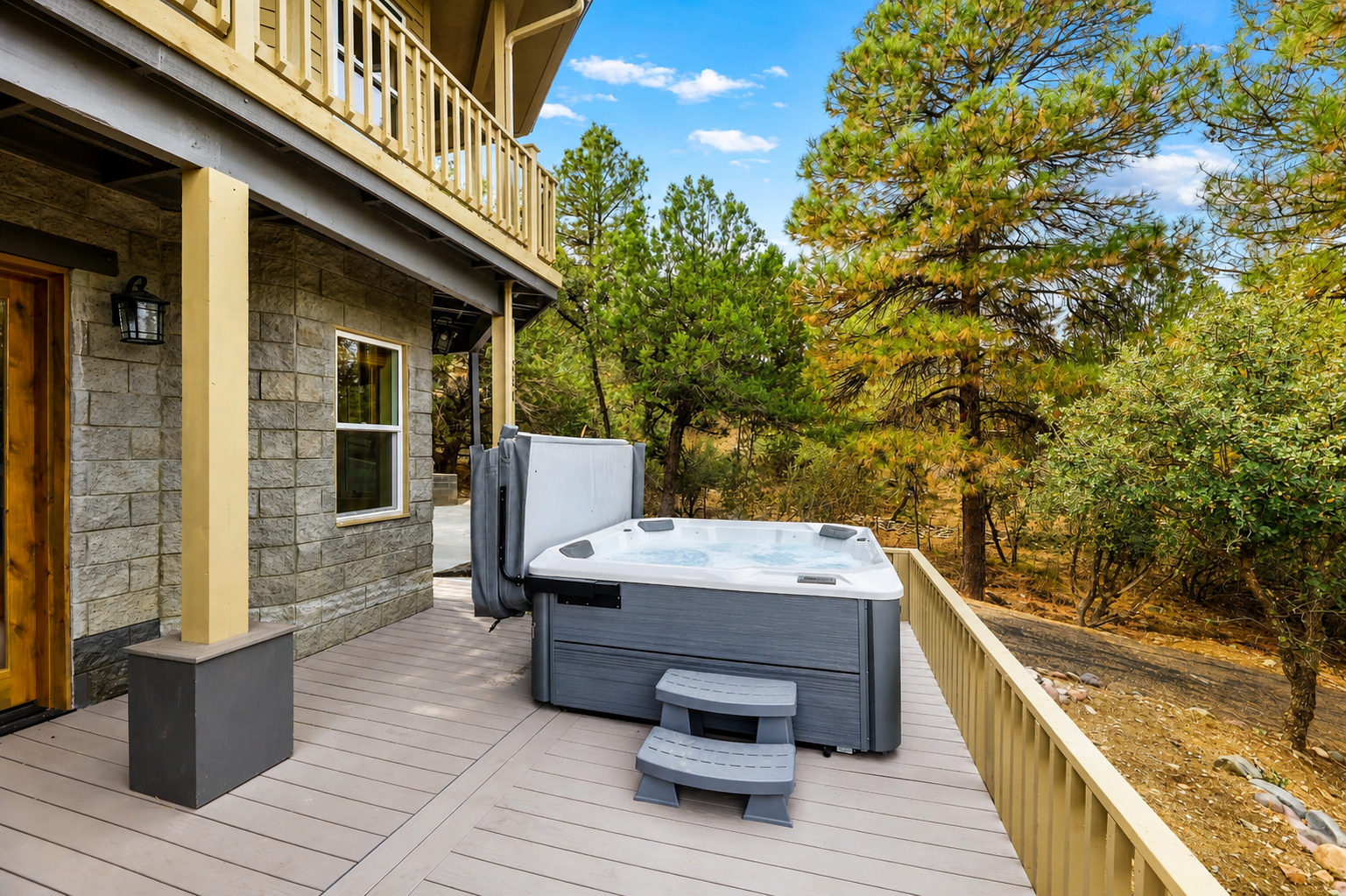 Granite Pines Chalet private hot tub with forest views