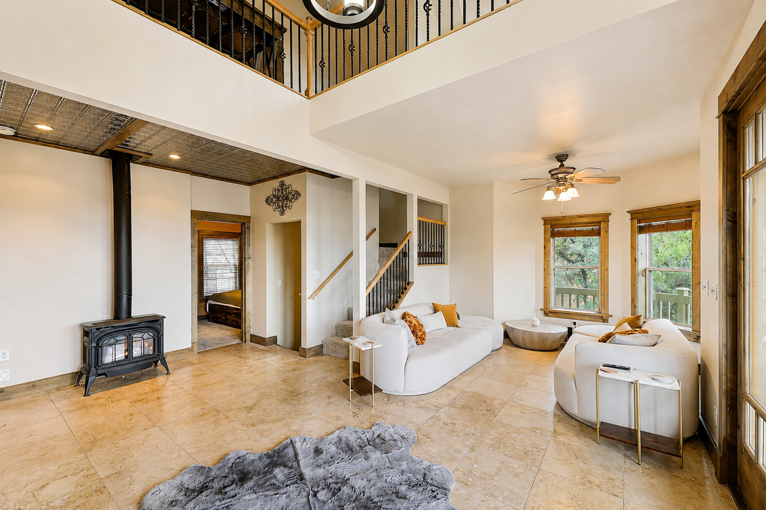 Granite Pines Chalet living room with fireplace and architectural volume