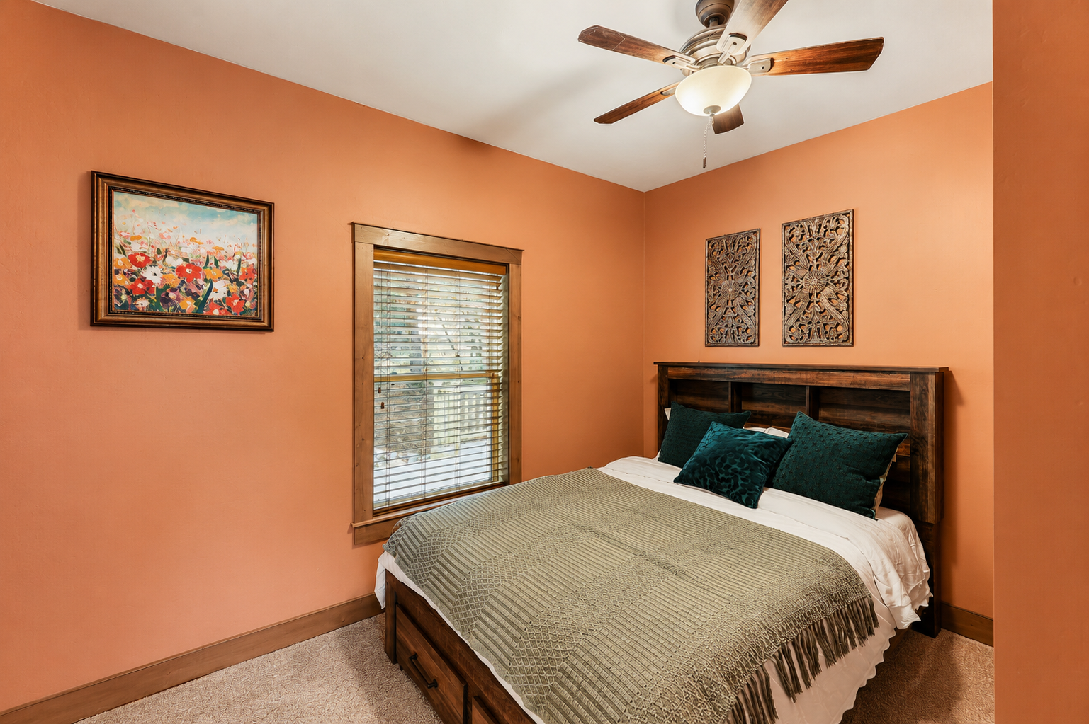 Granite Pines Chalet main floor queen bedroom with ensuite bathroom